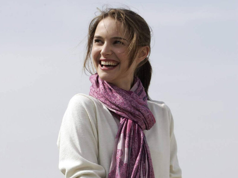 woman smiling with scarf