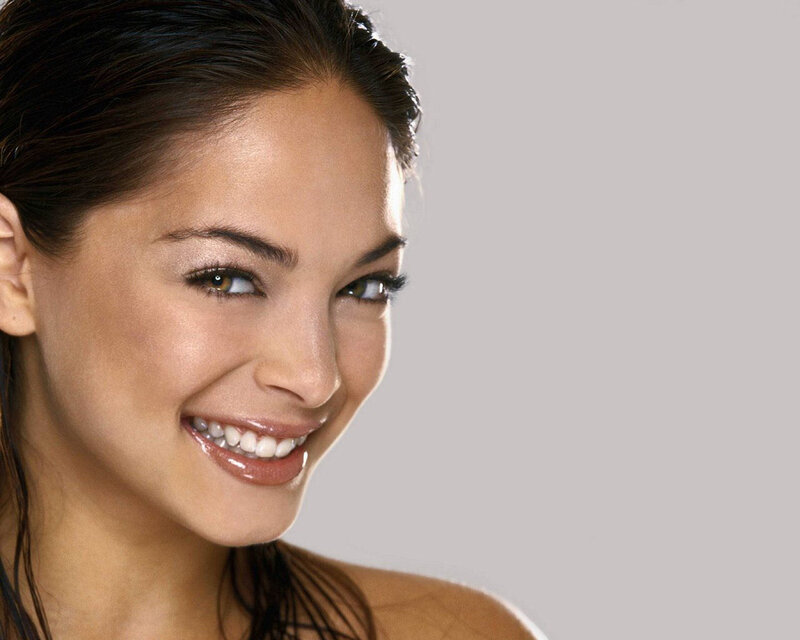 woman smiling with wet hair