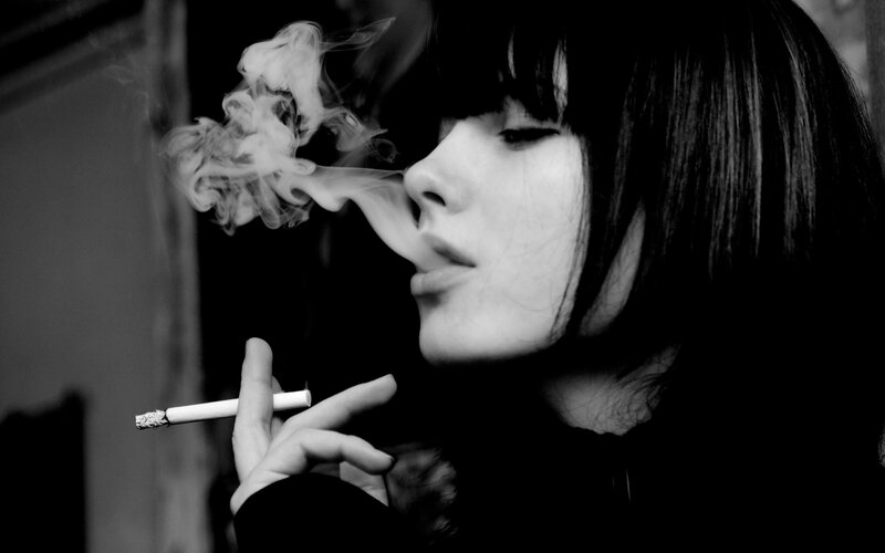 woman smoking a cigarette
