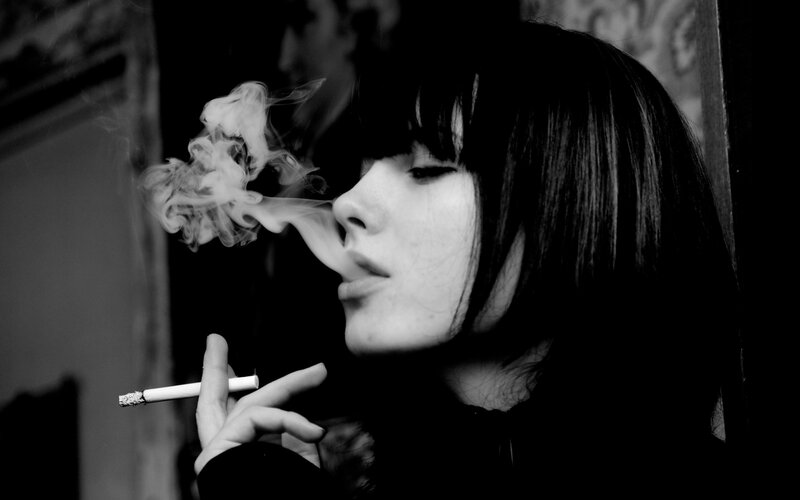 woman smoking a cigarette