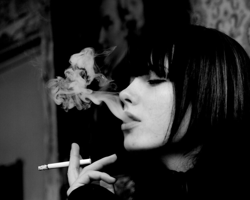 woman smoking a cigarette