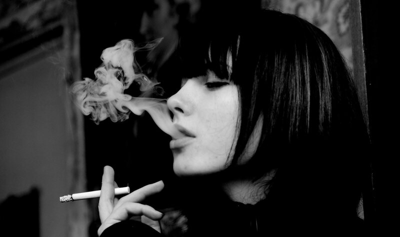 woman smoking a cigarette