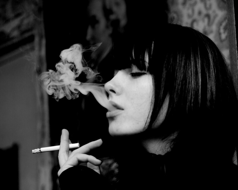 woman smoking a cigarette