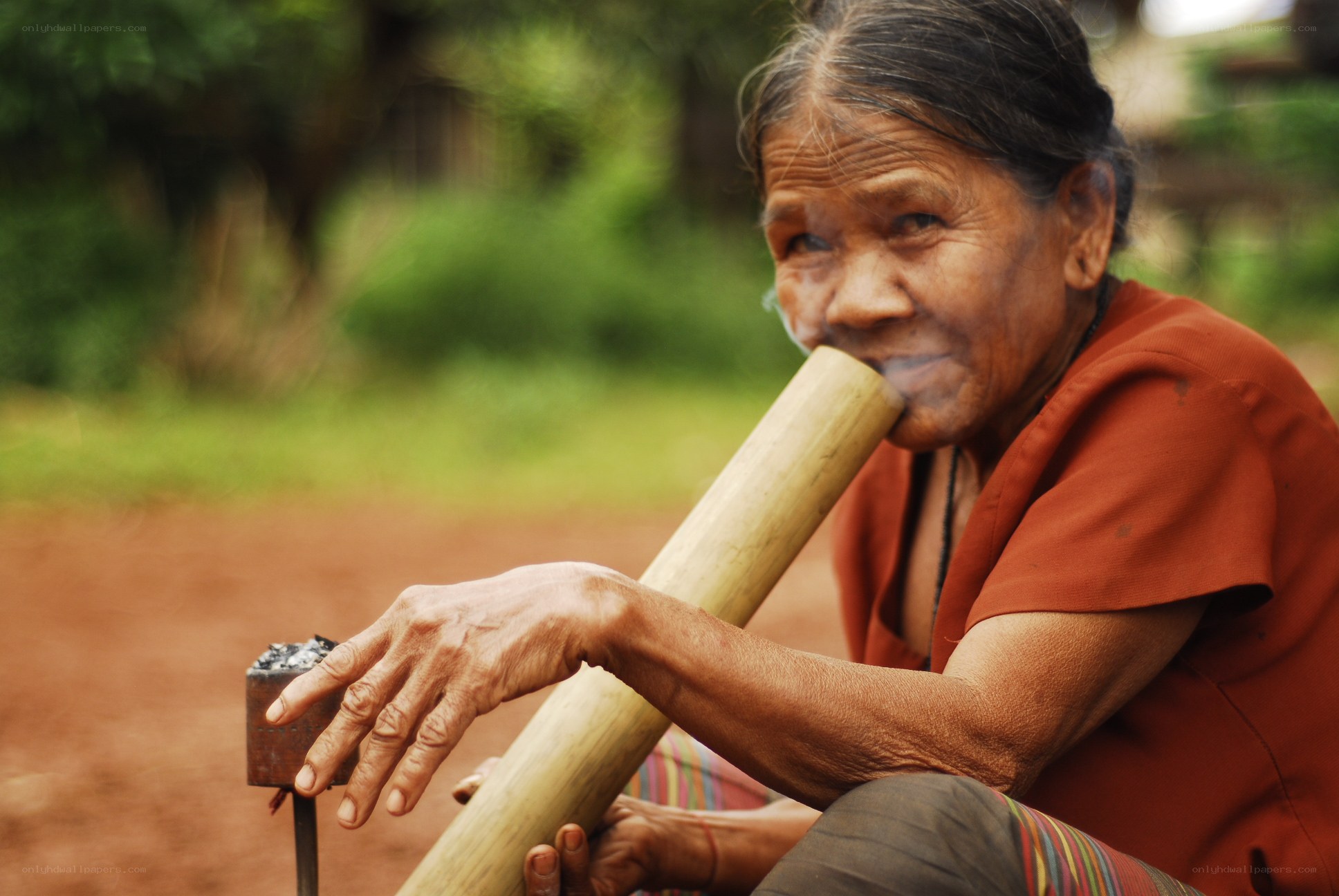 Woman smoking a pipe