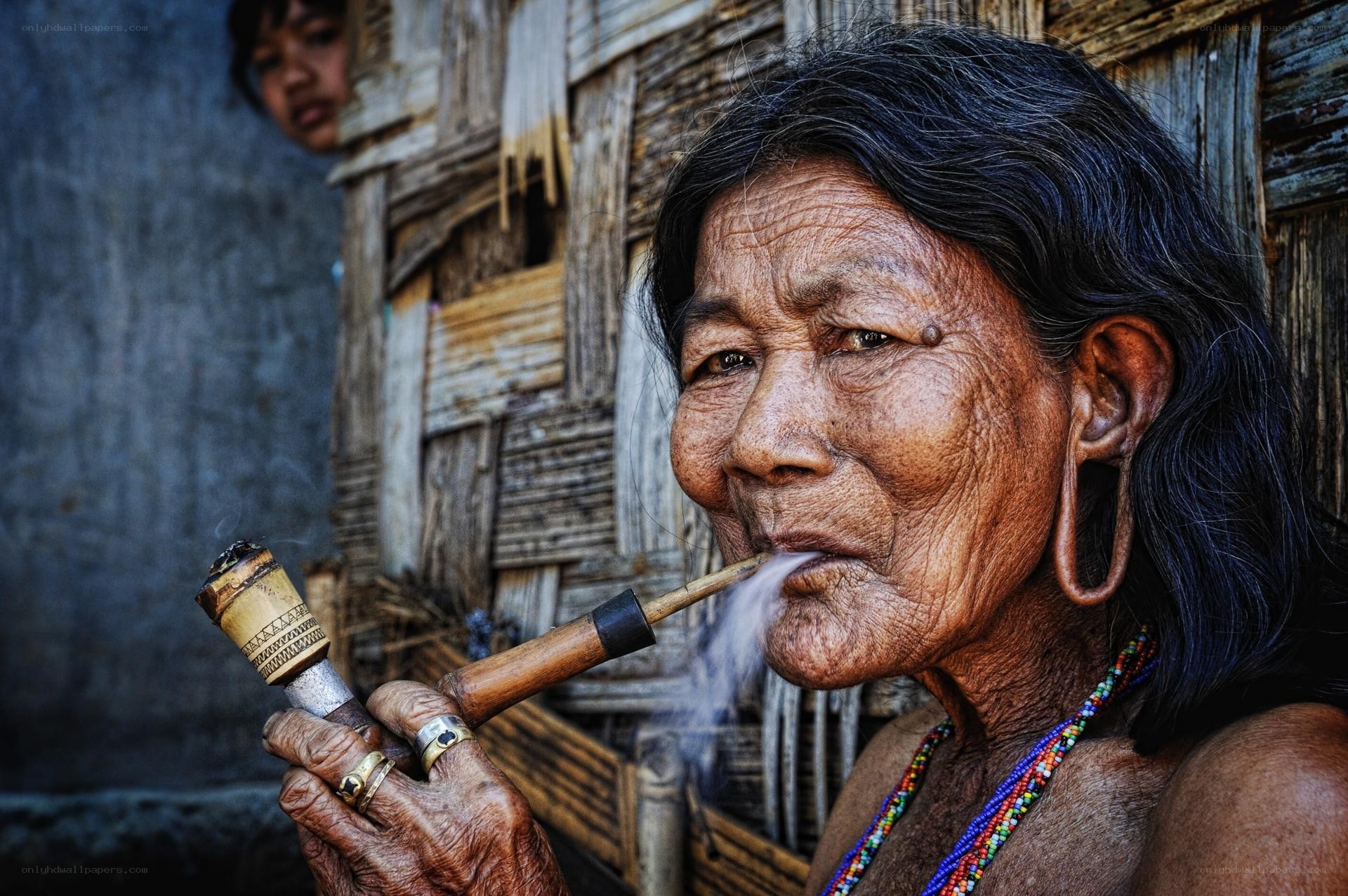 Woman smoking a pipe