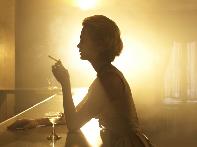 woman smoking at a bar