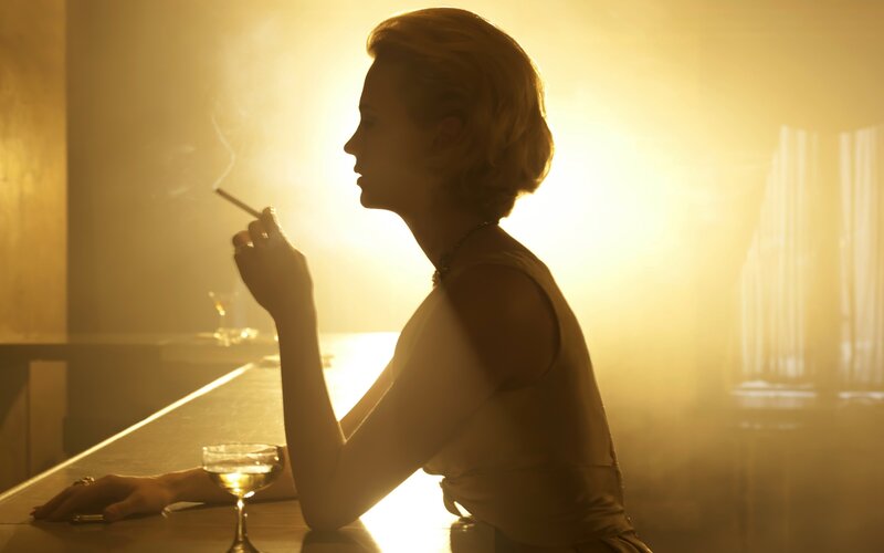 woman smoking at a bar