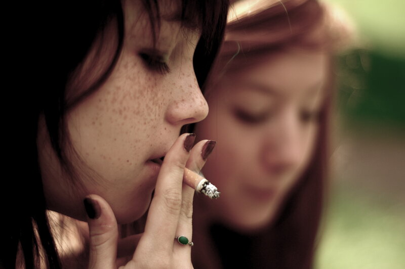 woman smoking cigarette