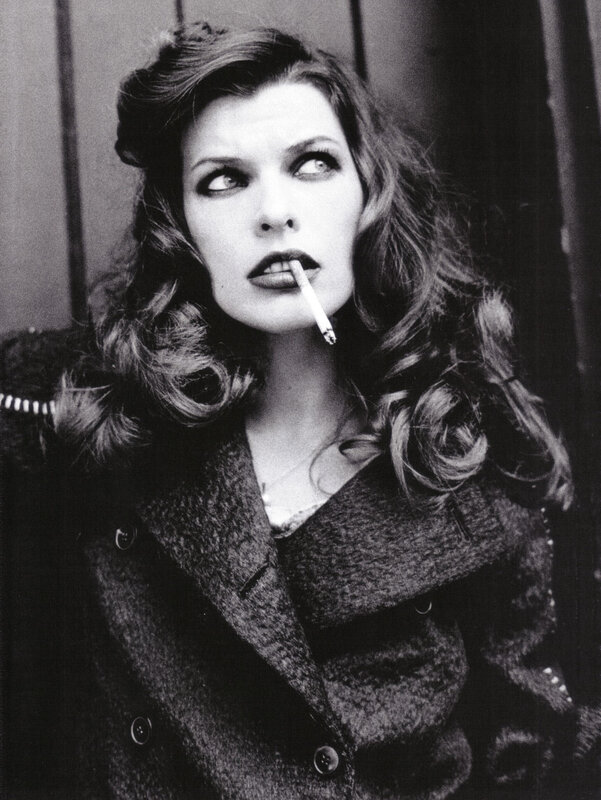 woman smoking cigarette