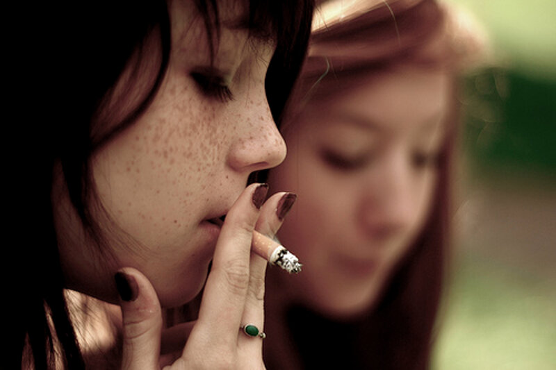 woman smoking cigarette