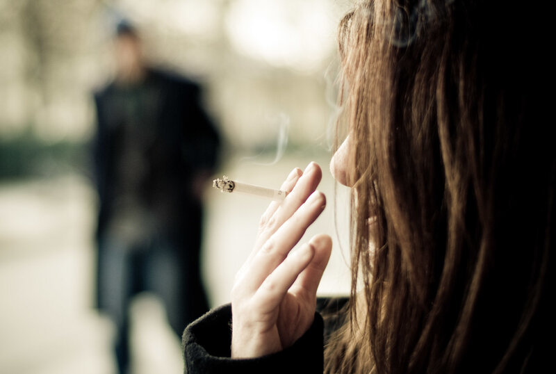 woman smoking cigarette