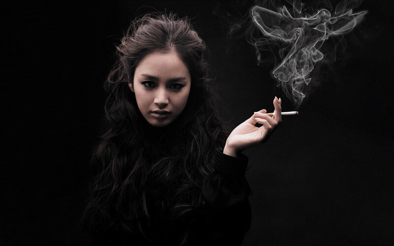 woman smoking cigarette