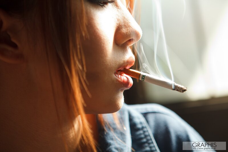 woman smoking cigarette