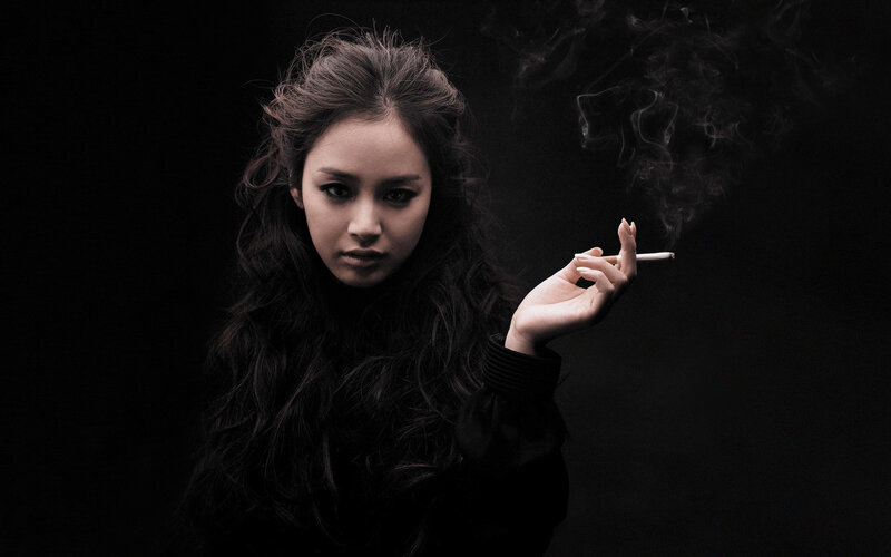woman smoking cigarette