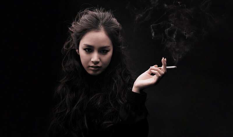 woman smoking cigarette