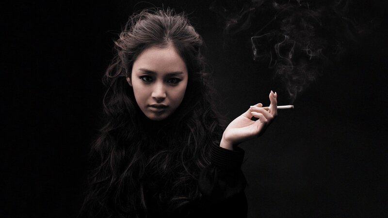 woman smoking cigarette