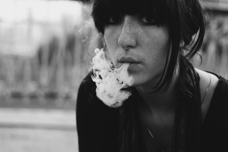 Woman Smoking Cigarette — Black, Dramatic, Photograph, Smoke, Freckles
