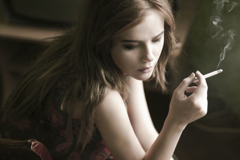 Woman Smoking Cigarette — Brown, Contemplative