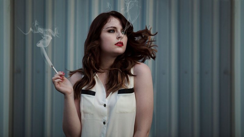Woman Smoking Cigarette — White, Dramatic, Photograph