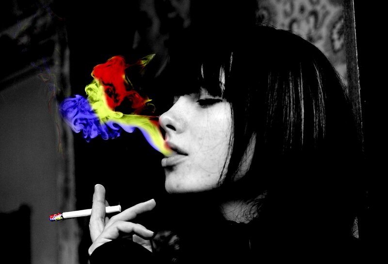 woman smoking colorful smoke