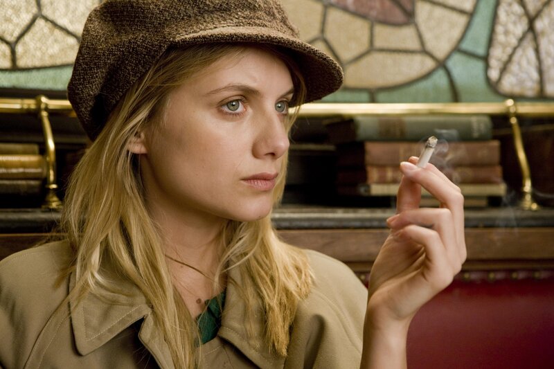 woman smoking in a cafe