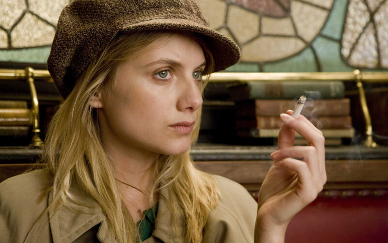 woman smoking in a cafe