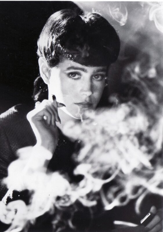 woman smoking in black and white