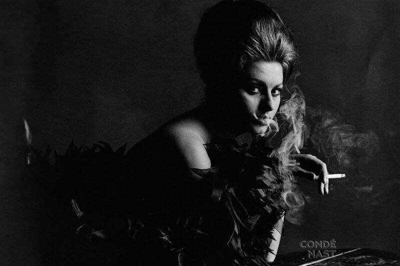 woman smoking in black and white