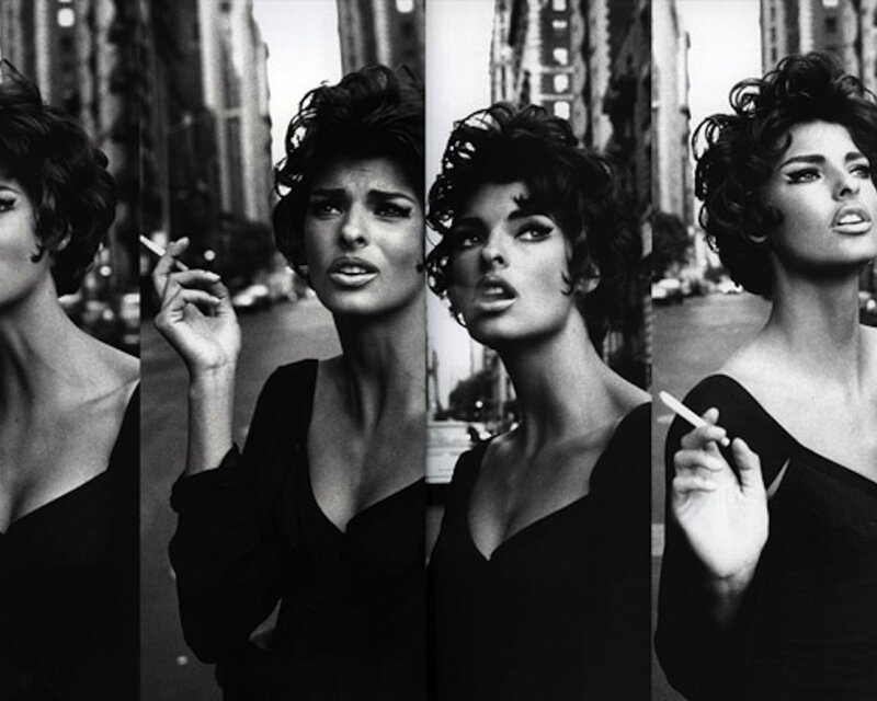 woman smoking in city