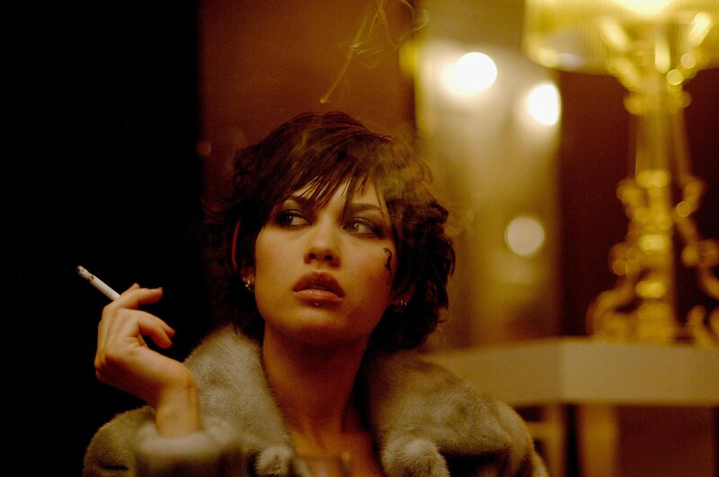 woman smoking in dim light