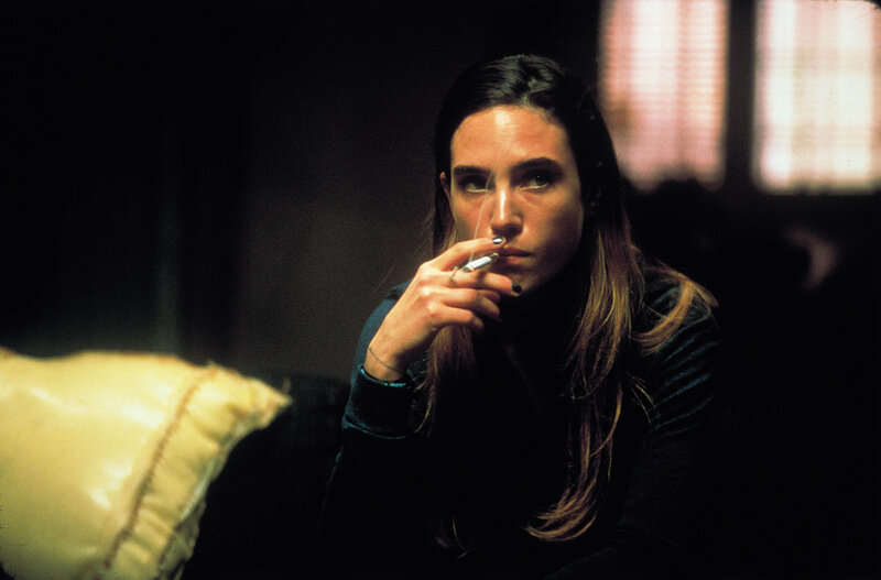 woman smoking in dim light