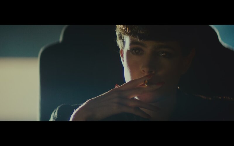 woman smoking in dim light