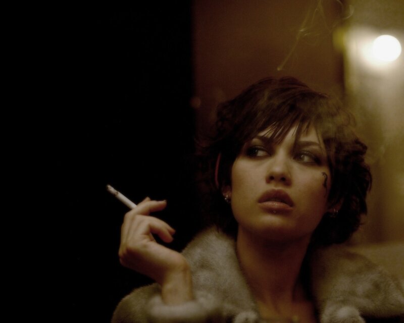 woman smoking in dim light