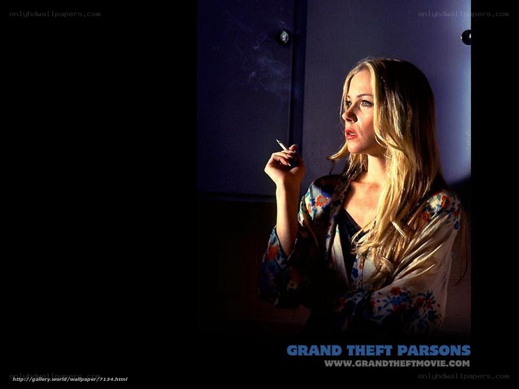 woman smoking in dim light