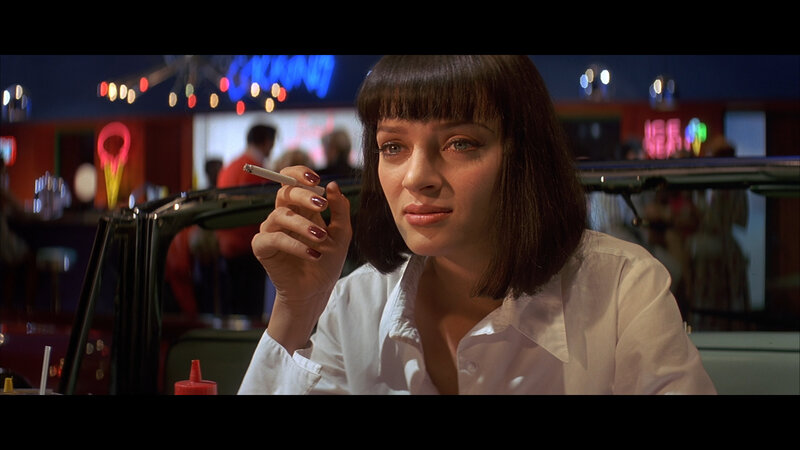 woman smoking in diner