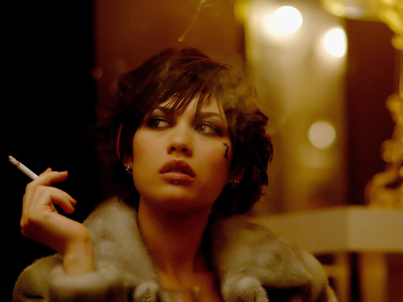 woman smoking in fur coat