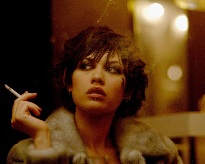 woman smoking in fur coat