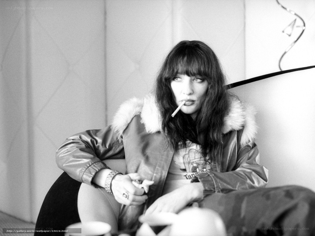 woman smoking in jacket