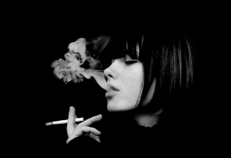 woman smoking in profile