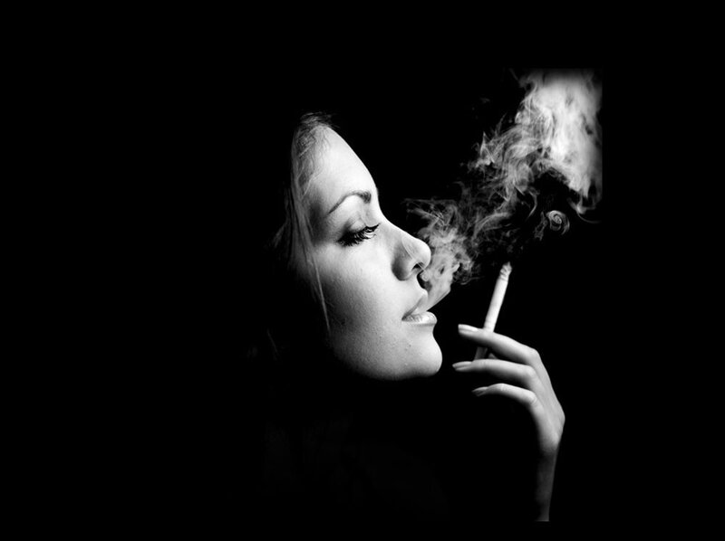 woman smoking in profile