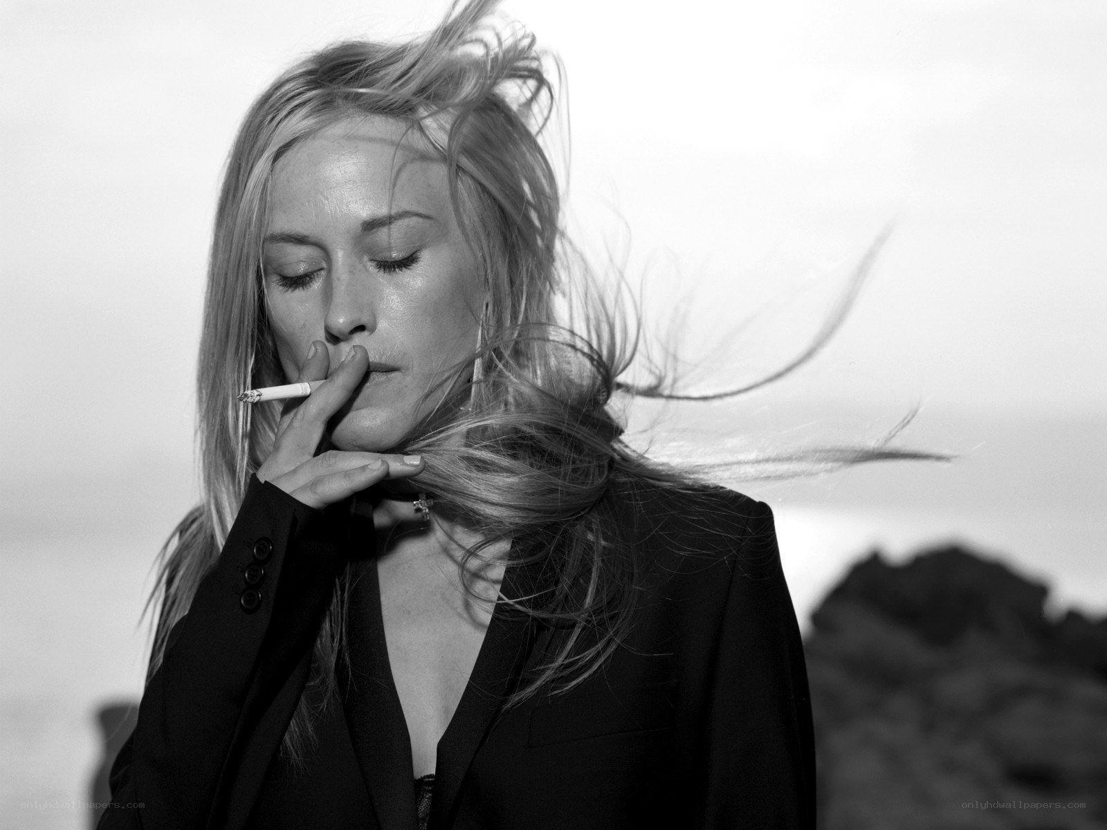 woman smoking in wind