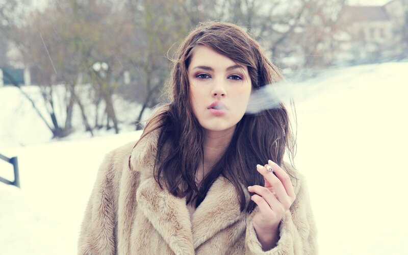 woman smoking in winter