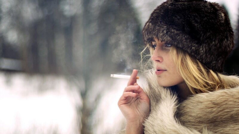 woman smoking in winter