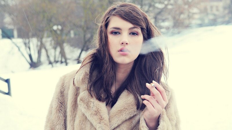 woman smoking in winter