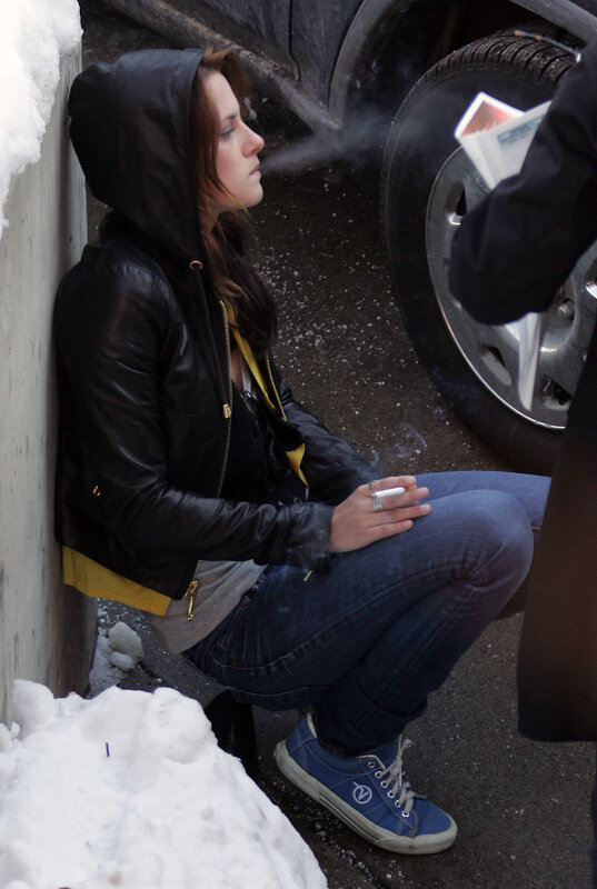 woman smoking on street