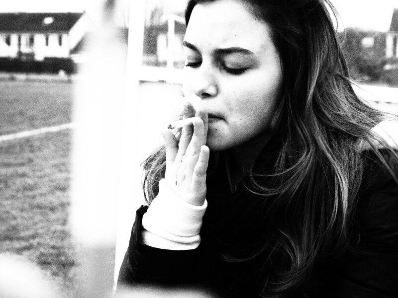 woman smoking outdoors