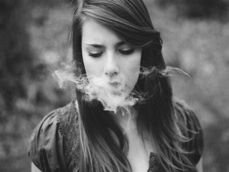 Woman Smoking Outdoors — Black