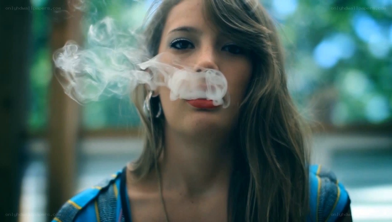 woman smoking vape