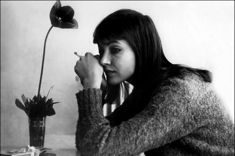 woman smoking with flower