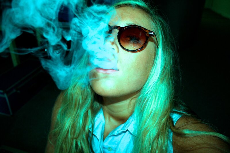 woman smoking with smoke